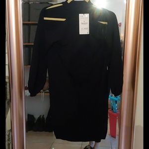 Zara shoulder showing black dress